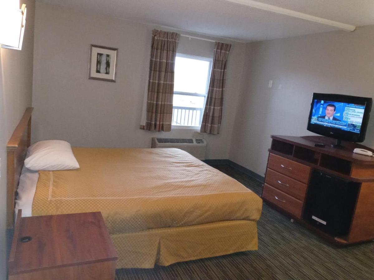 Peachtree Inn & Suites - Housity