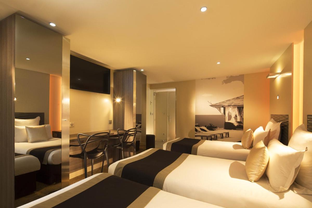 Coin salon dans l'établissement Hôtel Brésil Opéra SPA
