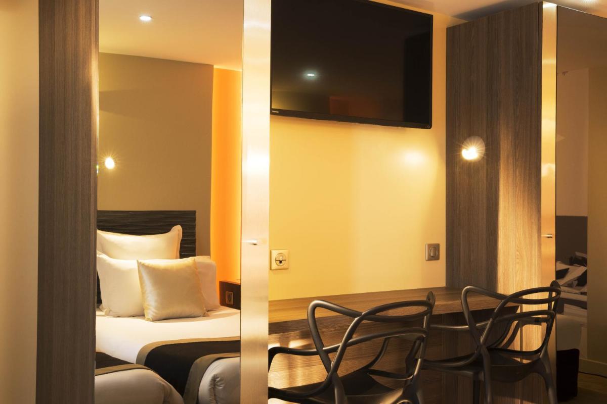 Coin salon dans l'établissement Hôtel Brésil Opéra SPA