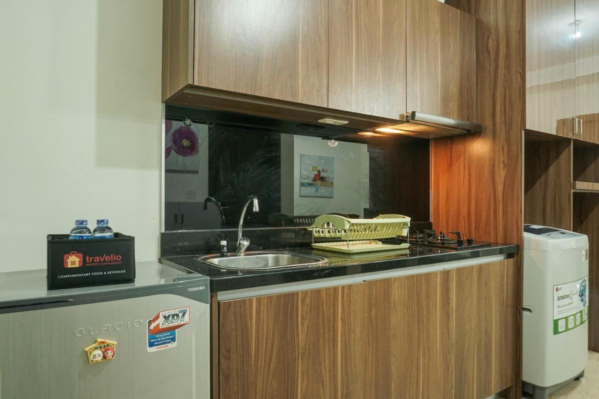 Luxury Design 1BR L'Avenue Apartment near Pancoran By Travelio - Housity