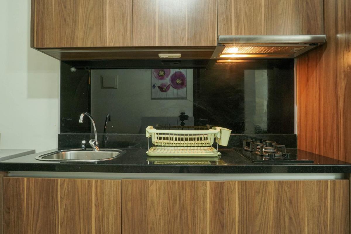 Luxury Design 1BR L'Avenue Apartment near Pancoran By Travelio - Housity