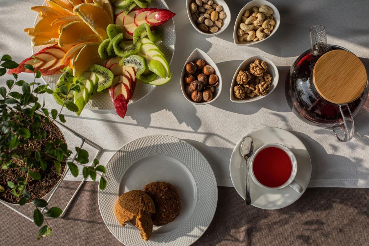 TINCHLIK PLAZA HOTEL - Hizvo