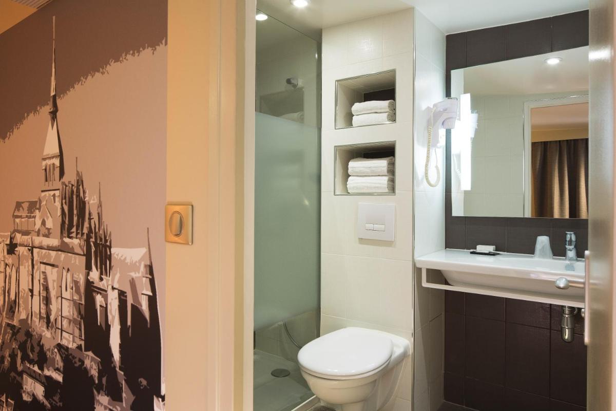 Salle de bains dans l'établissement Hôtel Brésil Opéra SPA