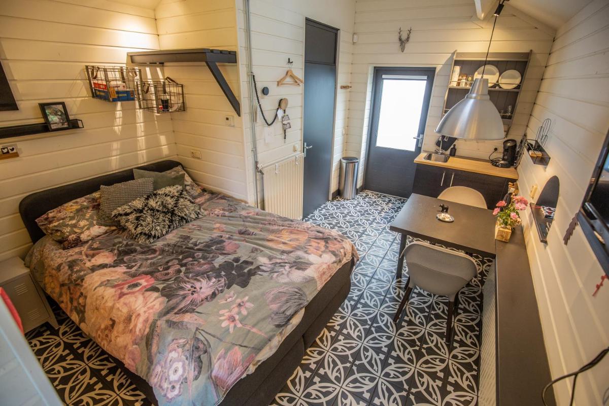 Knusse studio met jacuzzi in Elst (Ut) - Housity