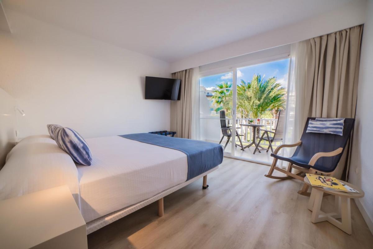 Cama o camas de una habitación en Blau Punta Reina