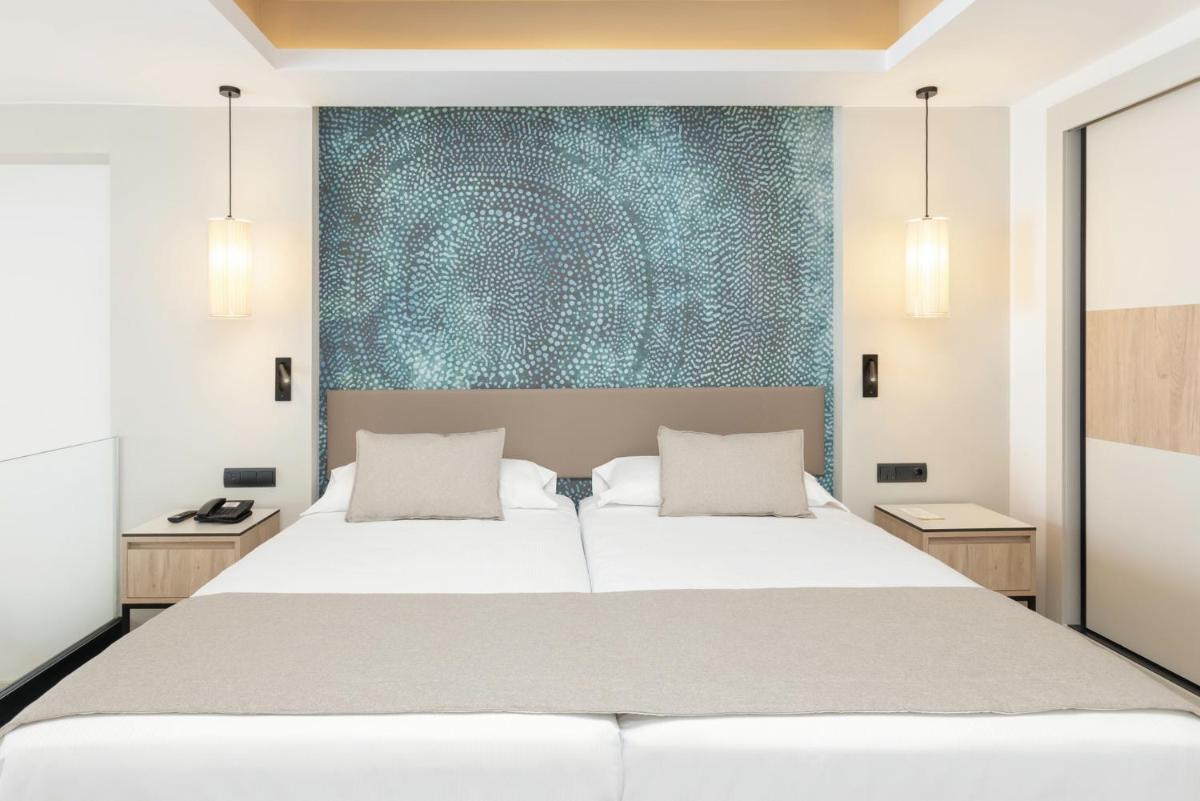 Cama o camas de una habitación en Hotel Riu Palace Jandia