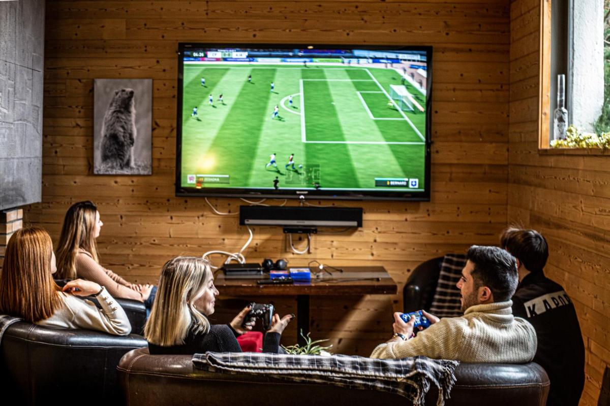 Télévision ou salle de divertissement dans l'établissement Sancy Resort