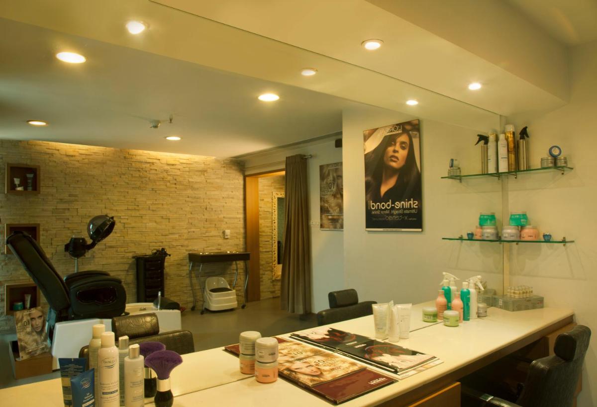 a room with a table with cosmetics on it at Radisson Blu Hotel Pune Kharadi in Pune