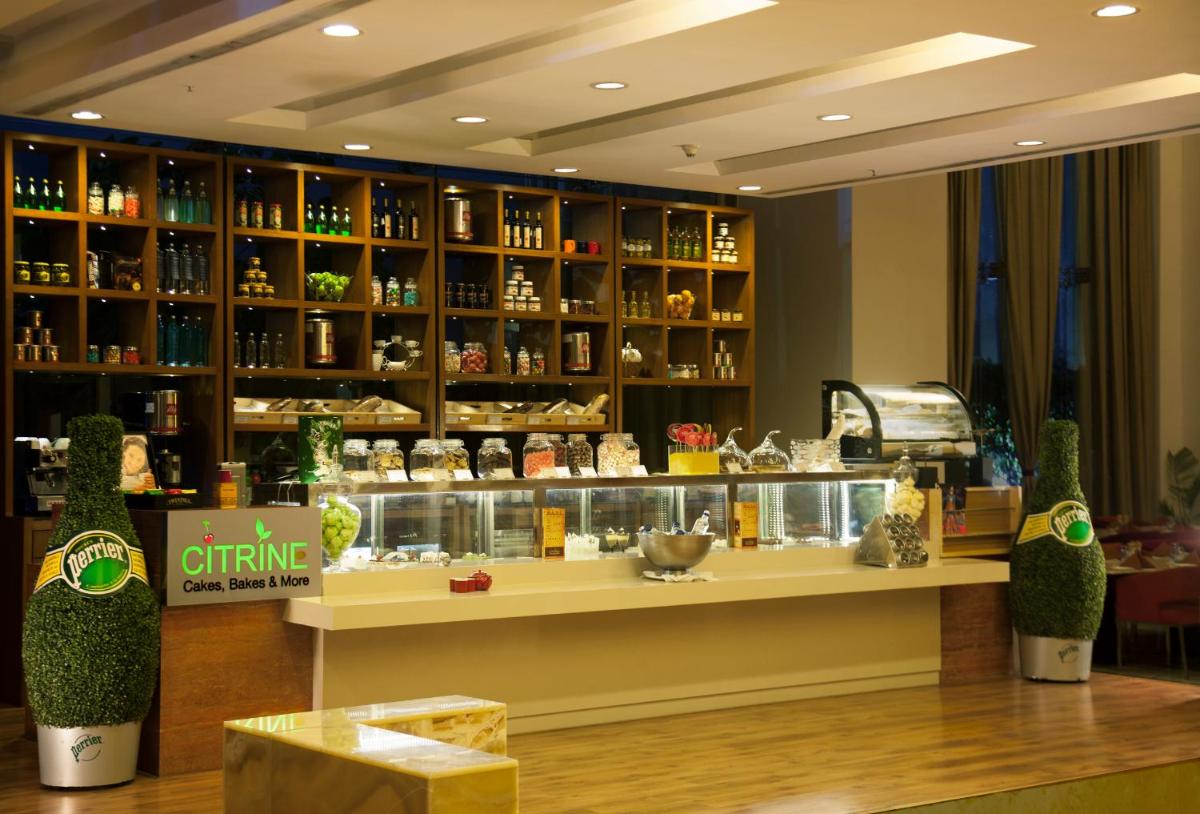 a shop with a counter in a store at Radisson Blu Hotel Pune Kharadi in Pune