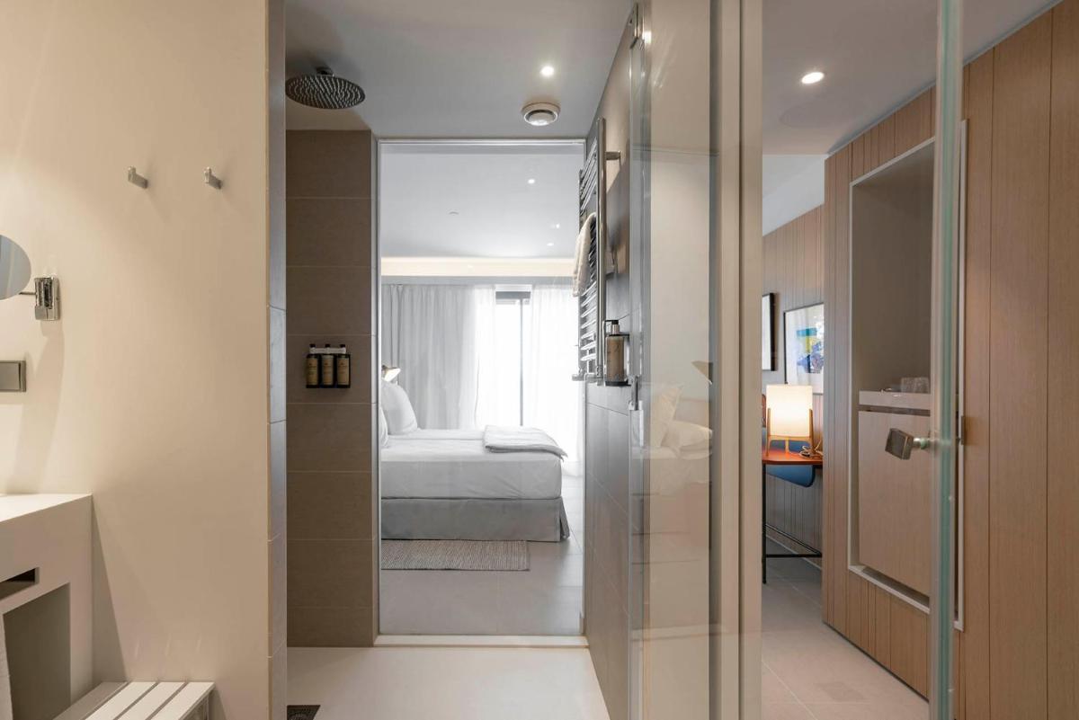 Cama o camas de una habitación en Parador de Aiguablava
