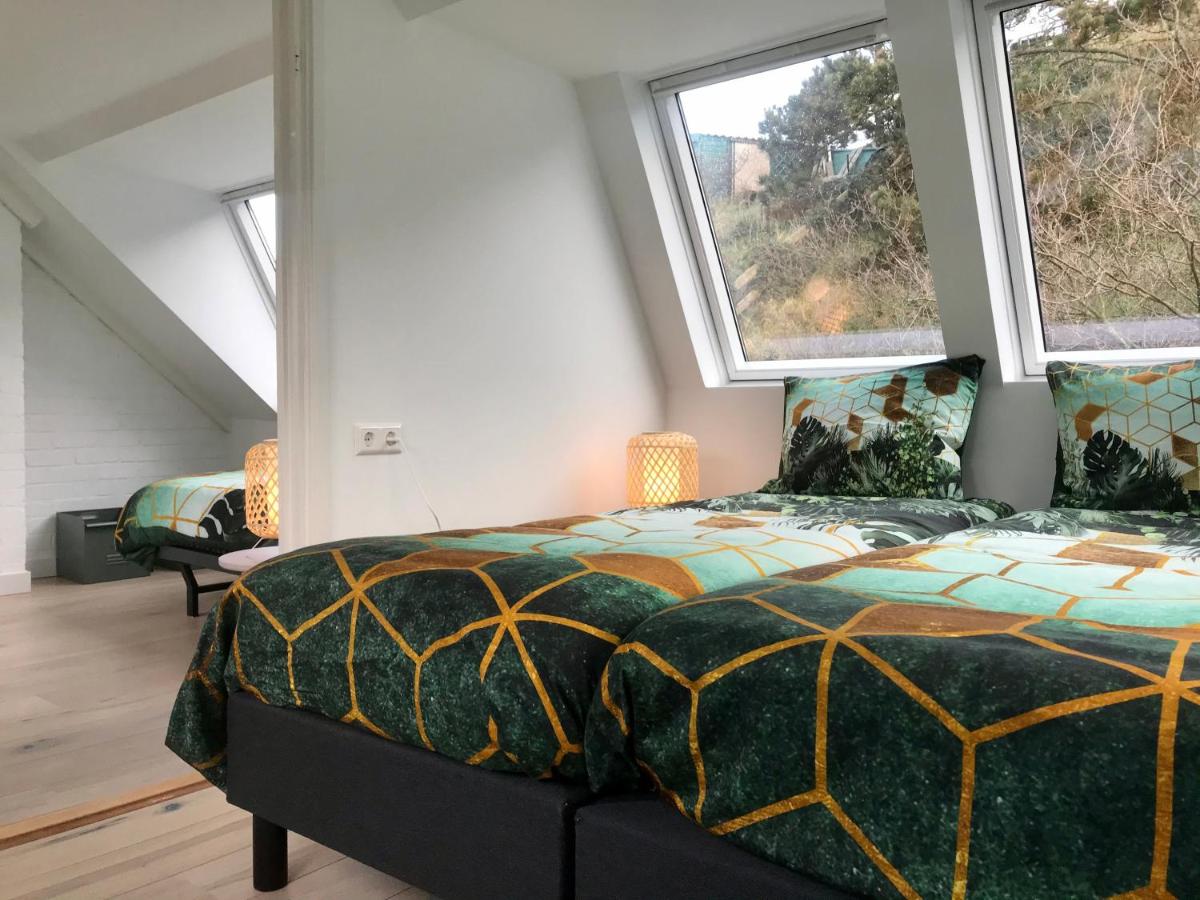 Das Luxus Dünenhäuschen mit Wellnesszugang - Housity
