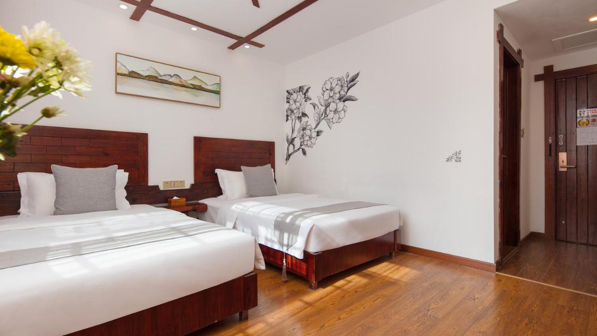 Floral Hotel · Spring Guesthouse Zhangjiajie - Housity