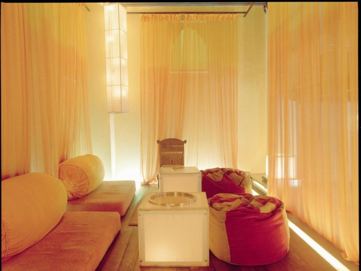 a living room with a couch and a table at The Park Kolkata in Kolkata