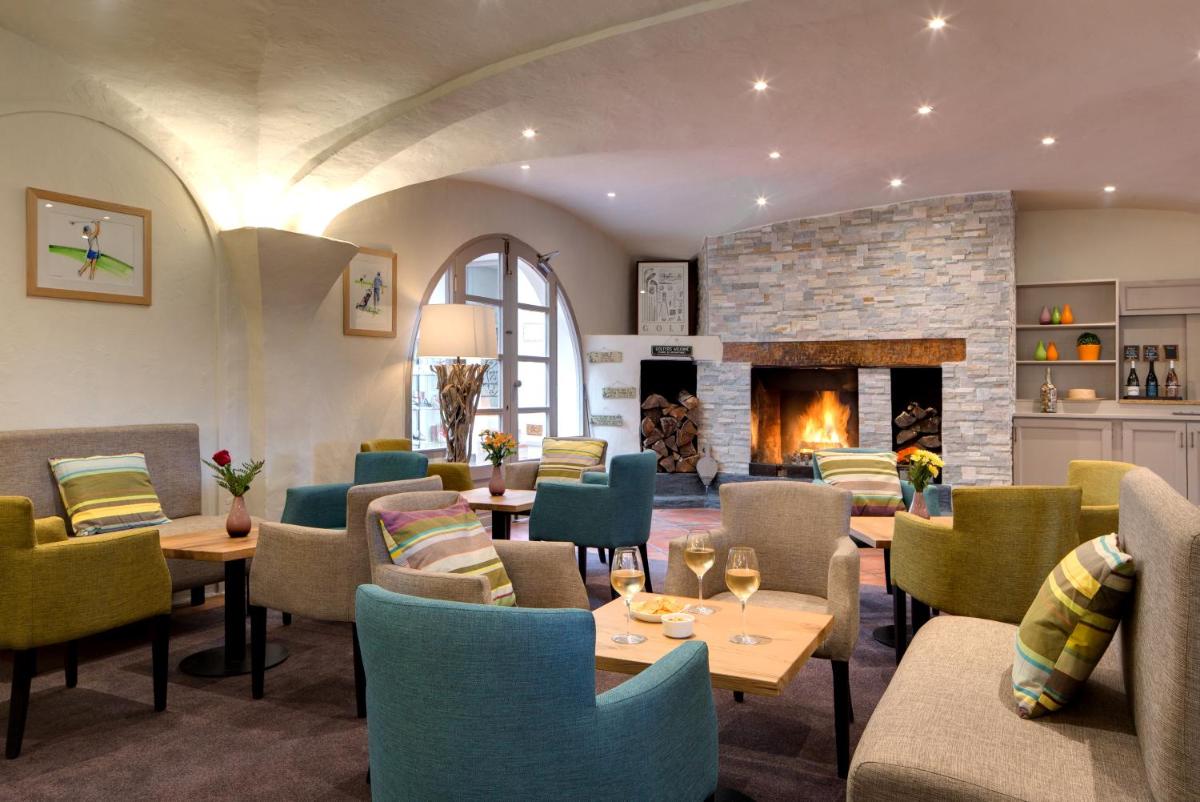 Coin salon dans l'établissement Le Domaine de Falgos Golf & Spa