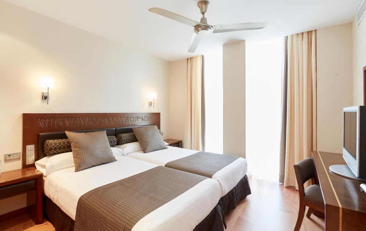 Cama o camas de una habitación en Insotel Fenicia Prestige Suites & Spa