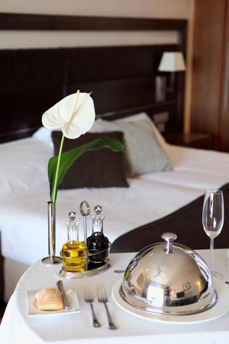 Cama o camas de una habitación en Insotel Fenicia Prestige Suites & Spa