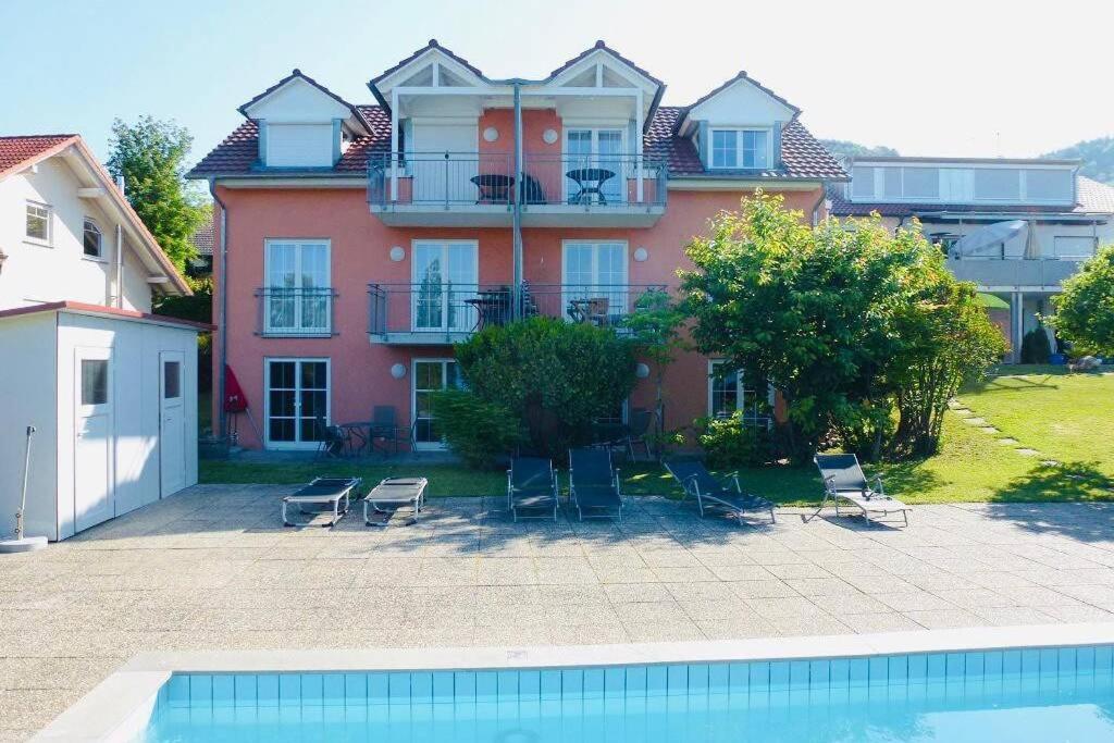 Die Seeblume - Ferienwohnung mit Pool und Seeblick - Housity