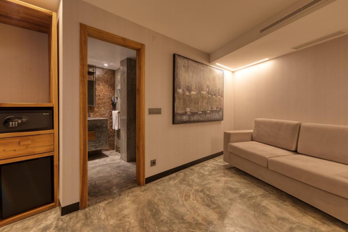 Uma área de estar em Well Hotel & Spa