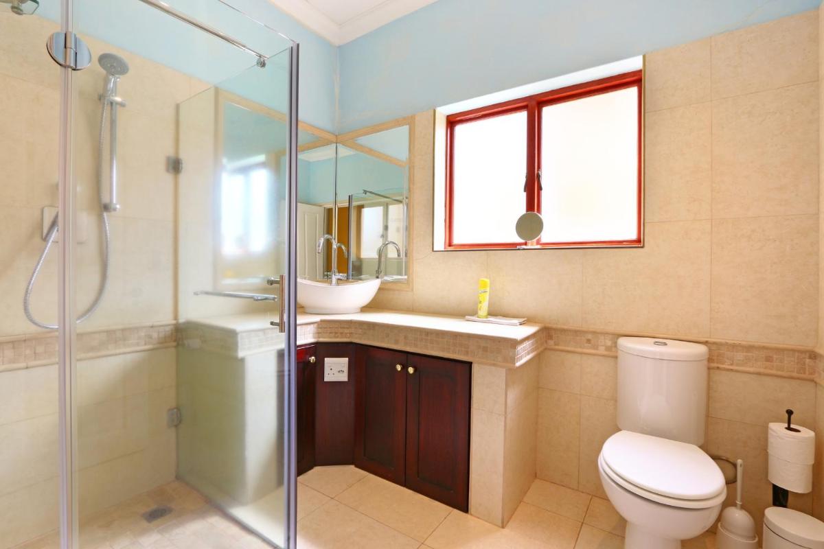 Coral Tree at Apricot Gardens Self-catering Gem Gordons Bay - Housity