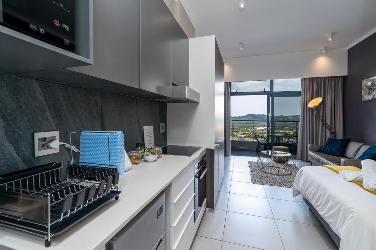 Suitetrails - Top Floor Menlyn Maine studio apartment with Stunning Views & No Load Shedding