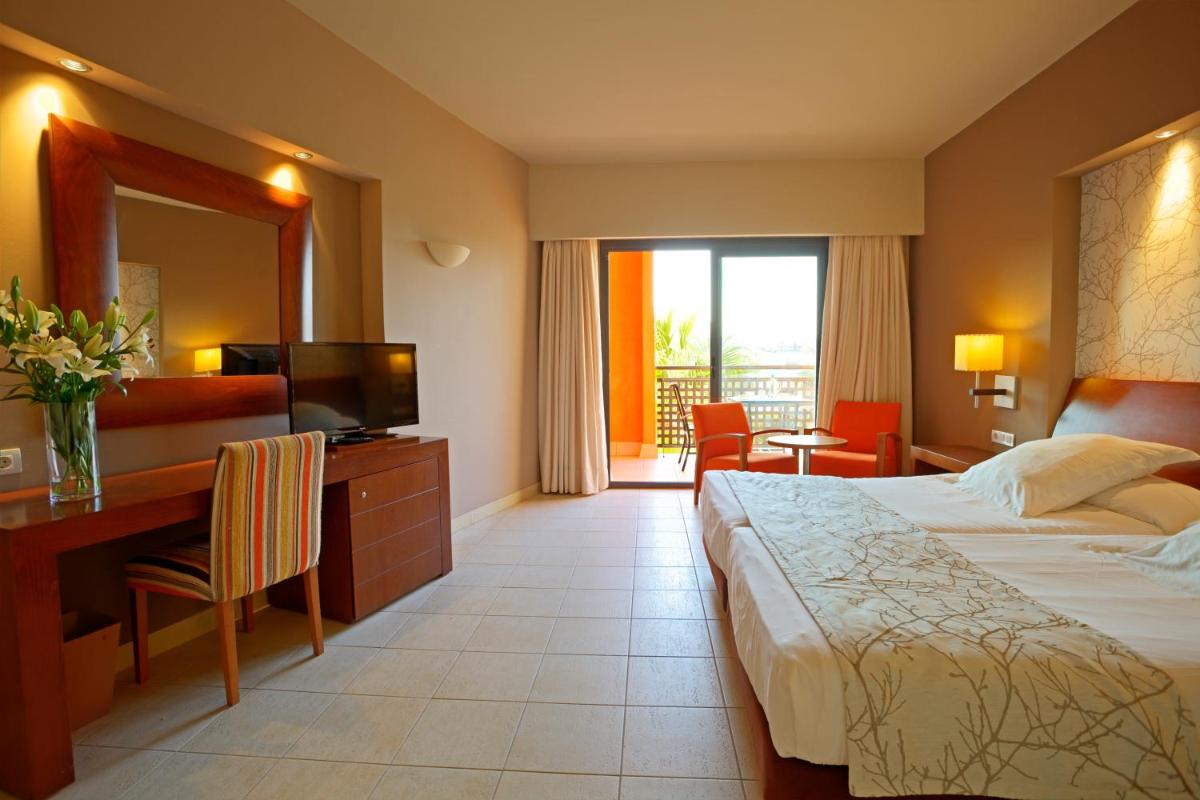 Cama o camas de una habitación en Hotel Valle del Este