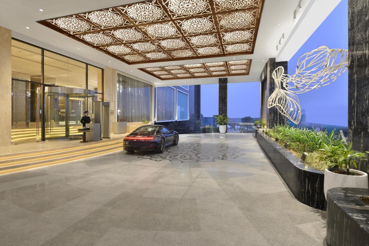 a car parked in the middle of a building at Taj Skyline Ahmedabad in Ahmedabad