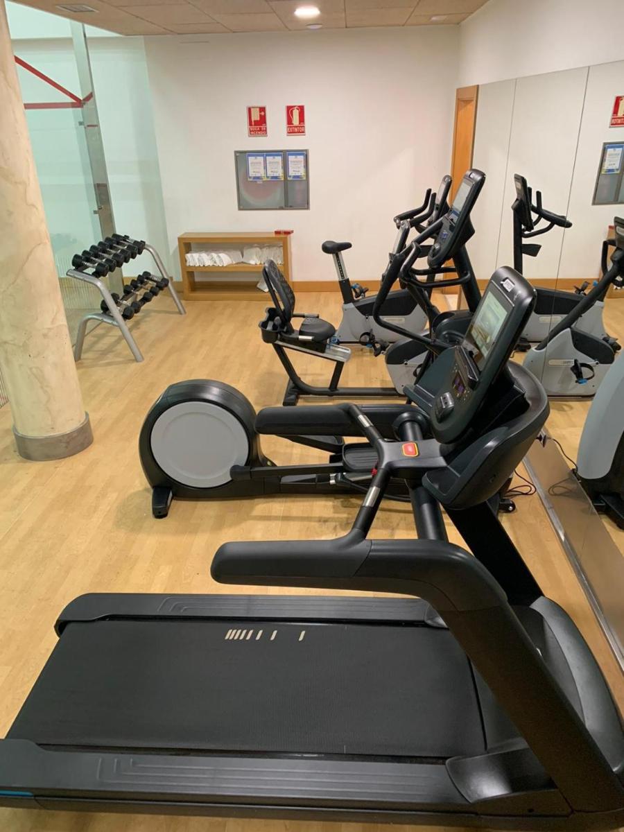 Gimnasio o instalaciones de fitness de Hotel Suite Villa Maria