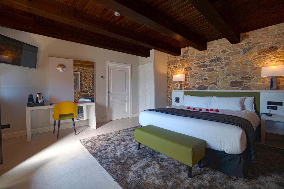 Cama o camas de una habitación en Hotel As Torres da Hermida