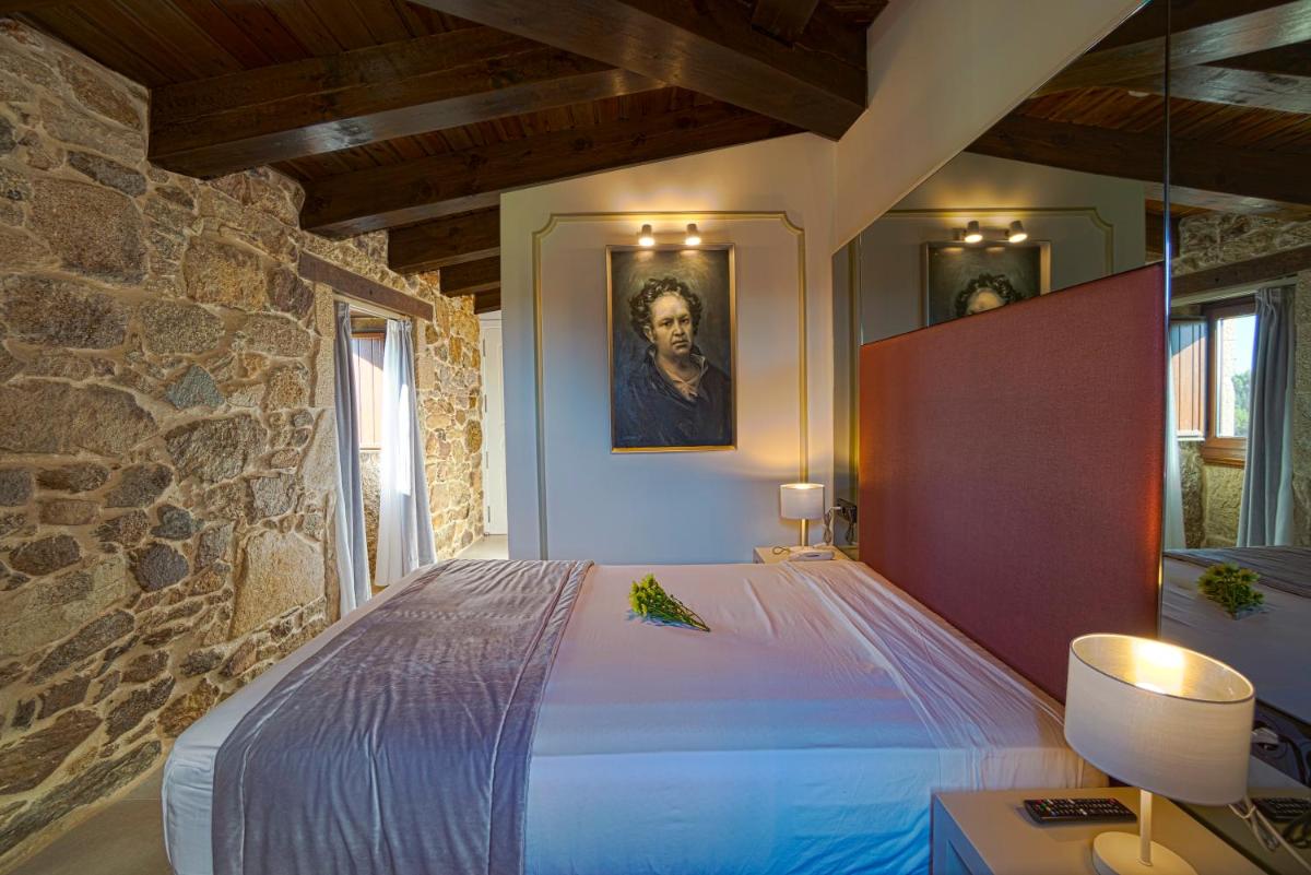 Cama o camas de una habitación en Hotel As Torres da Hermida