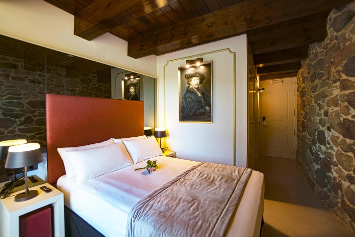 Cama o camas de una habitación en Hotel As Torres da Hermida