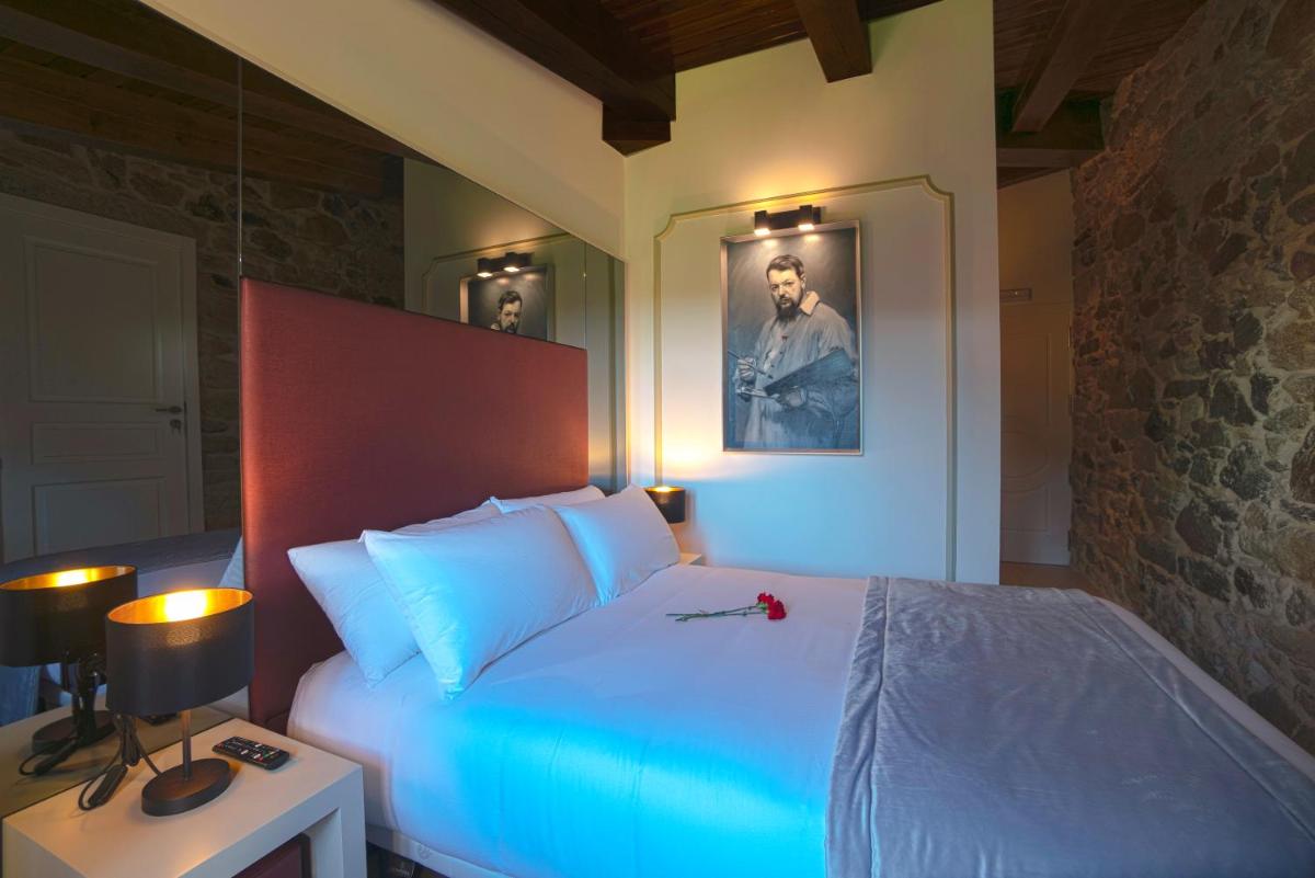Cama o camas de una habitación en Hotel As Torres da Hermida