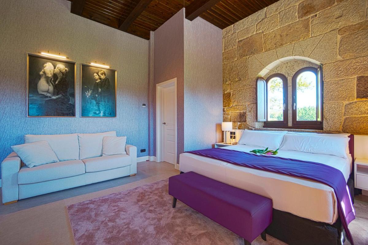 Cama o camas de una habitación en Hotel As Torres da Hermida