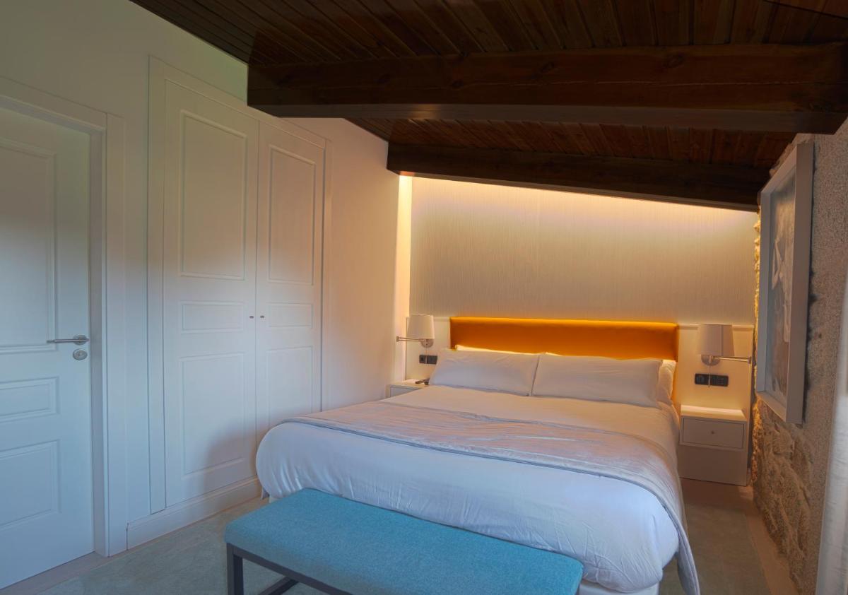 Cama o camas de una habitación en Hotel As Torres da Hermida
