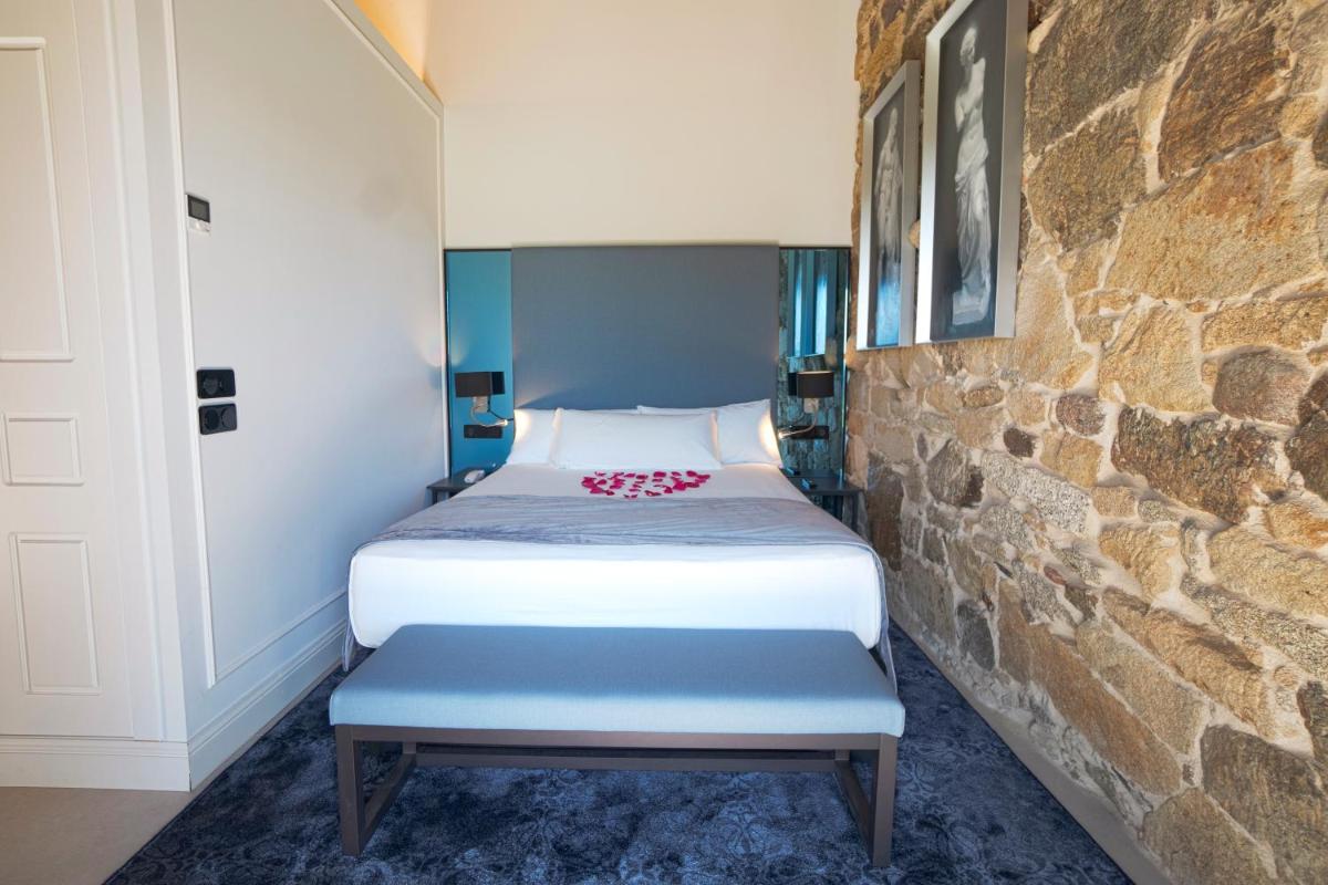 Cama o camas de una habitación en Hotel As Torres da Hermida