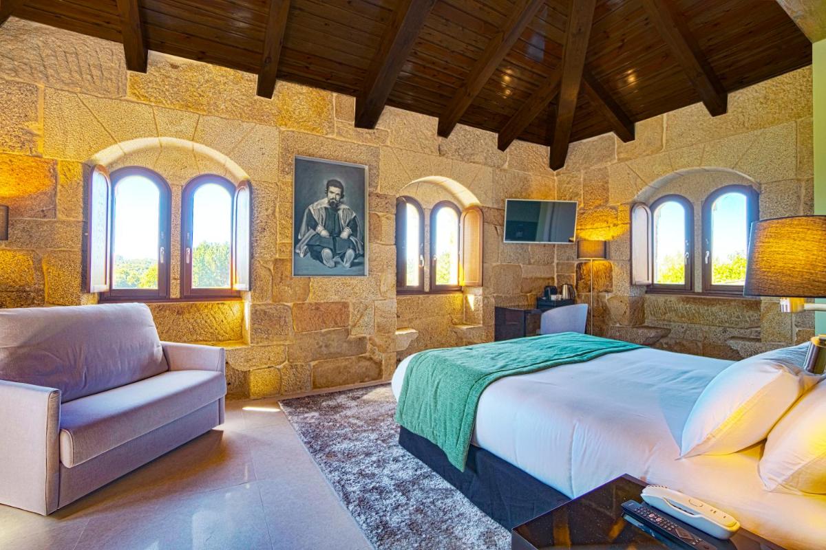 Cama o camas de una habitación en Hotel As Torres da Hermida