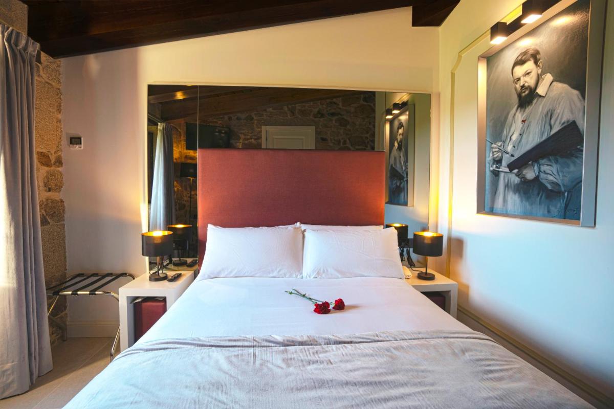 Cama o camas de una habitación en Hotel As Torres da Hermida