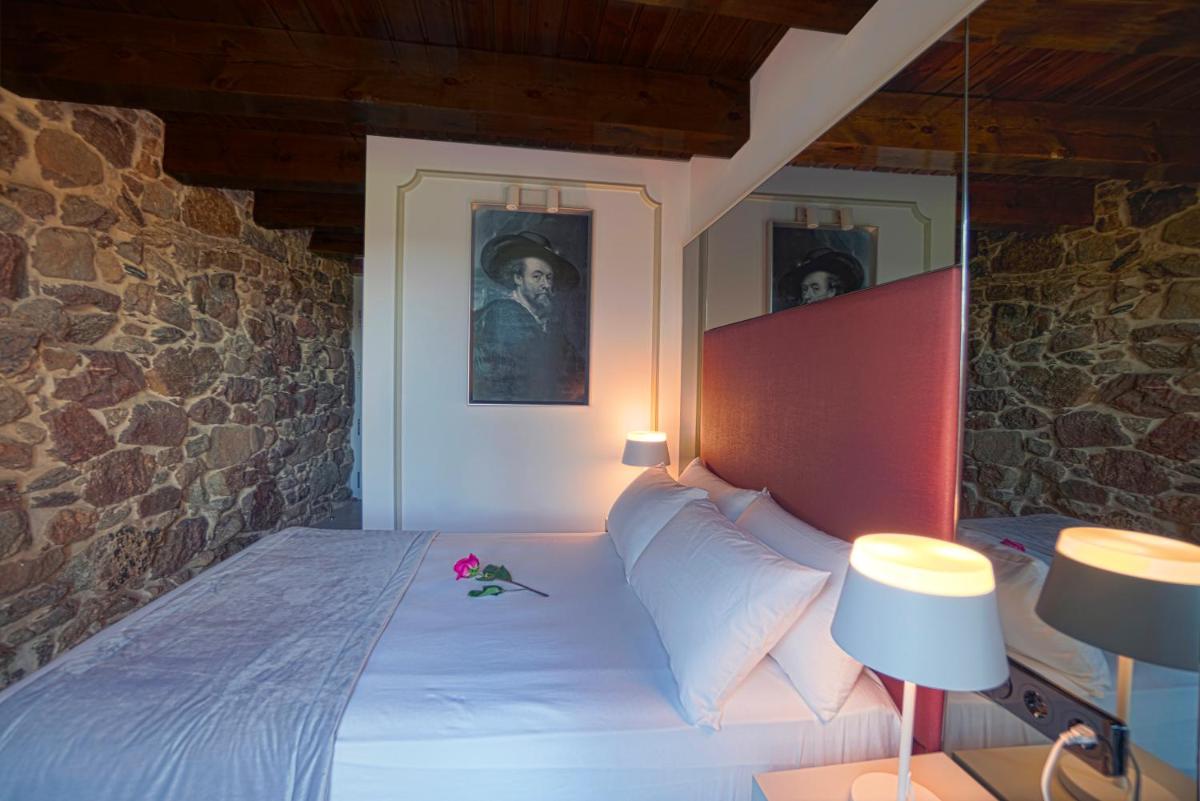 Cama o camas de una habitación en Hotel As Torres da Hermida