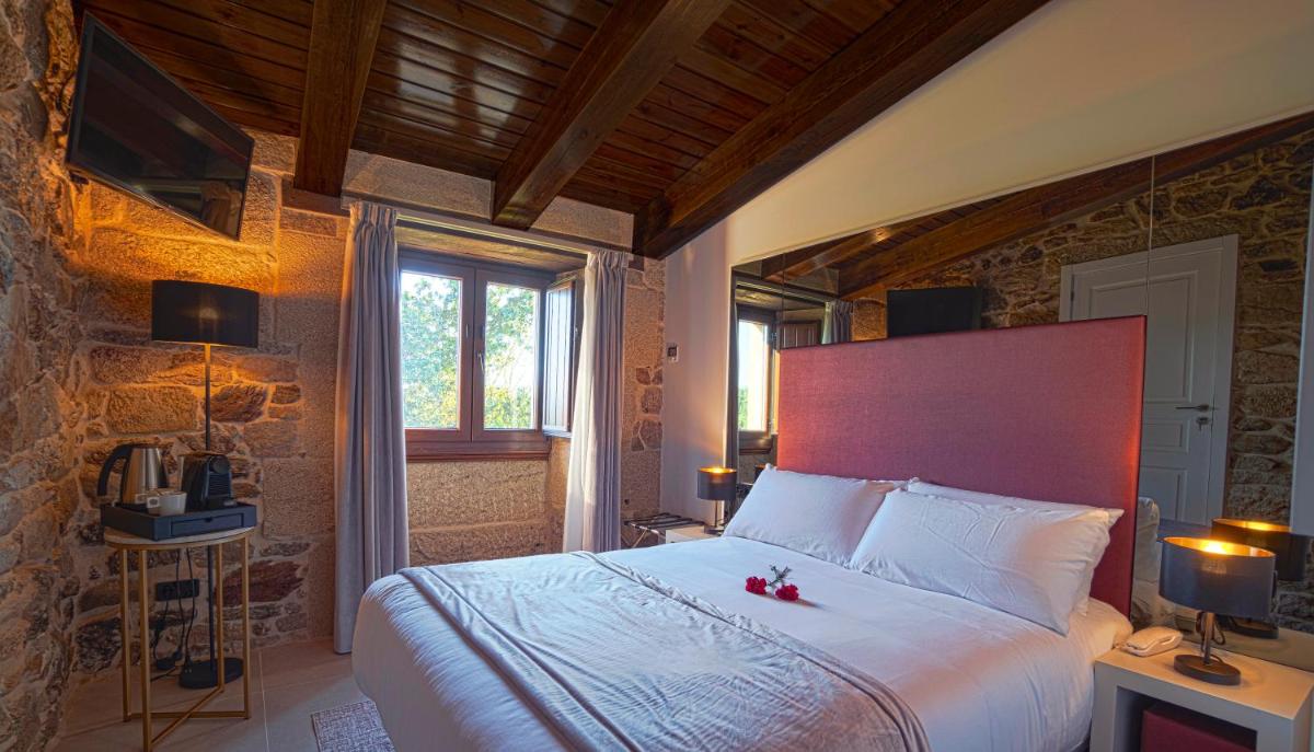 Cama o camas de una habitación en Hotel As Torres da Hermida