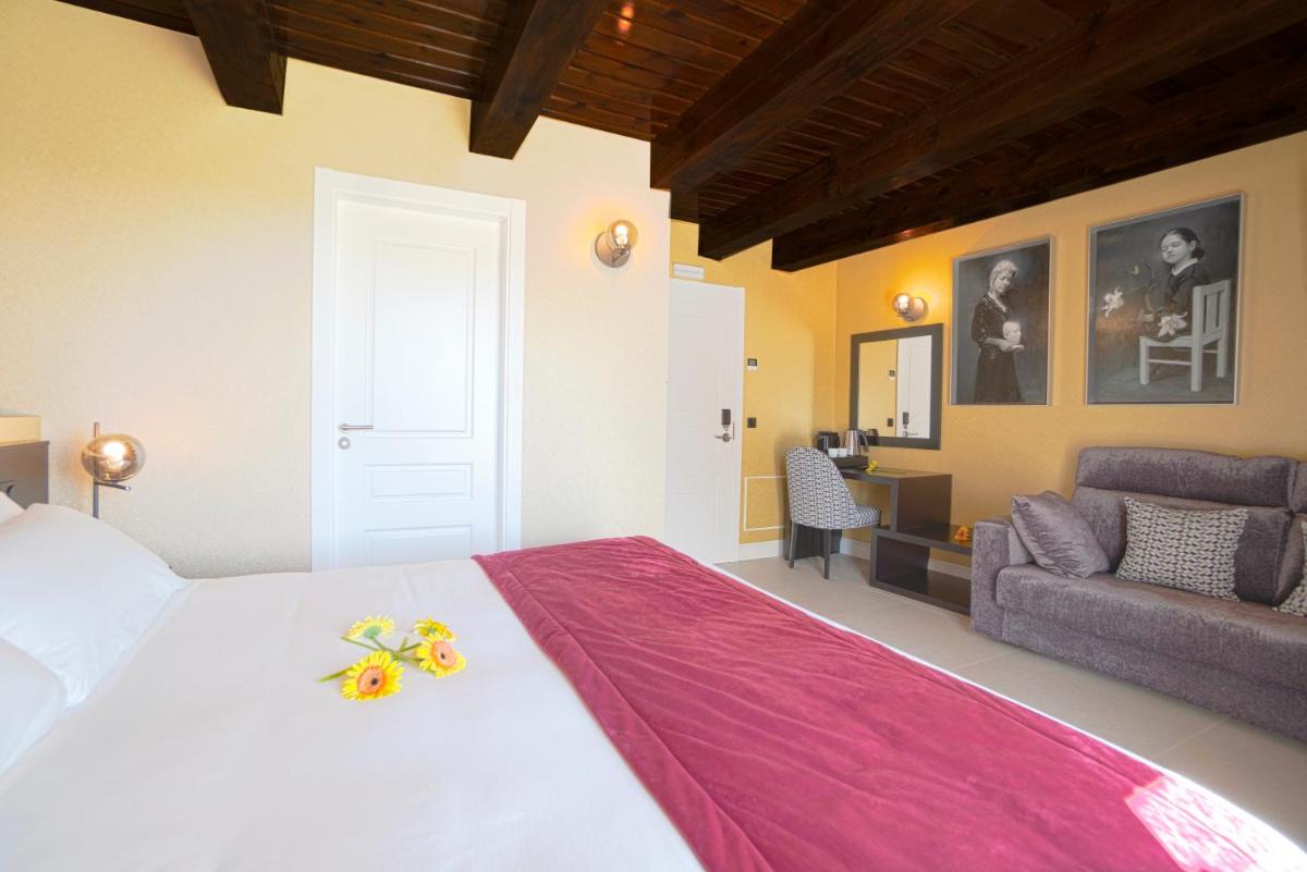 Cama o camas de una habitación en Hotel As Torres da Hermida