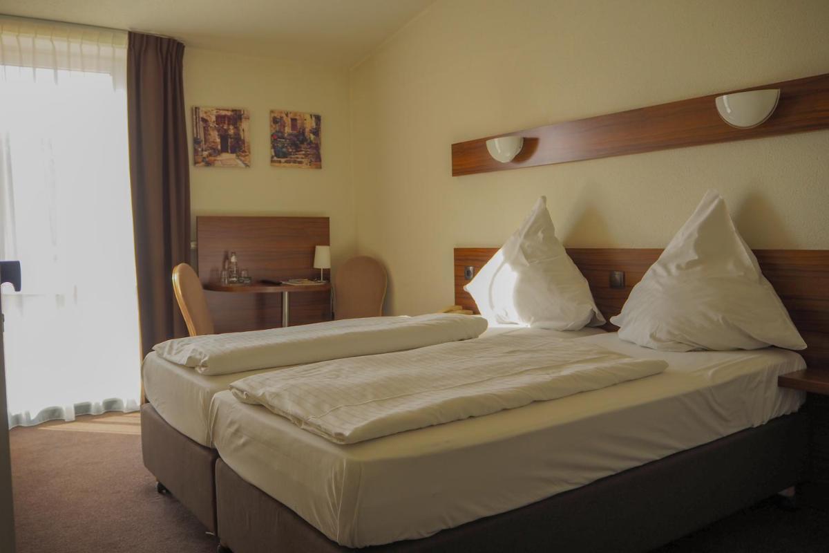 Hotel am Wall - Housity