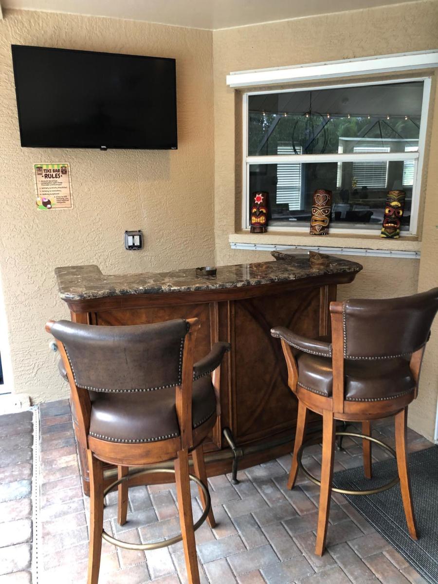 Tiki Paradise House & pool - 10 min to Beach! - Housity