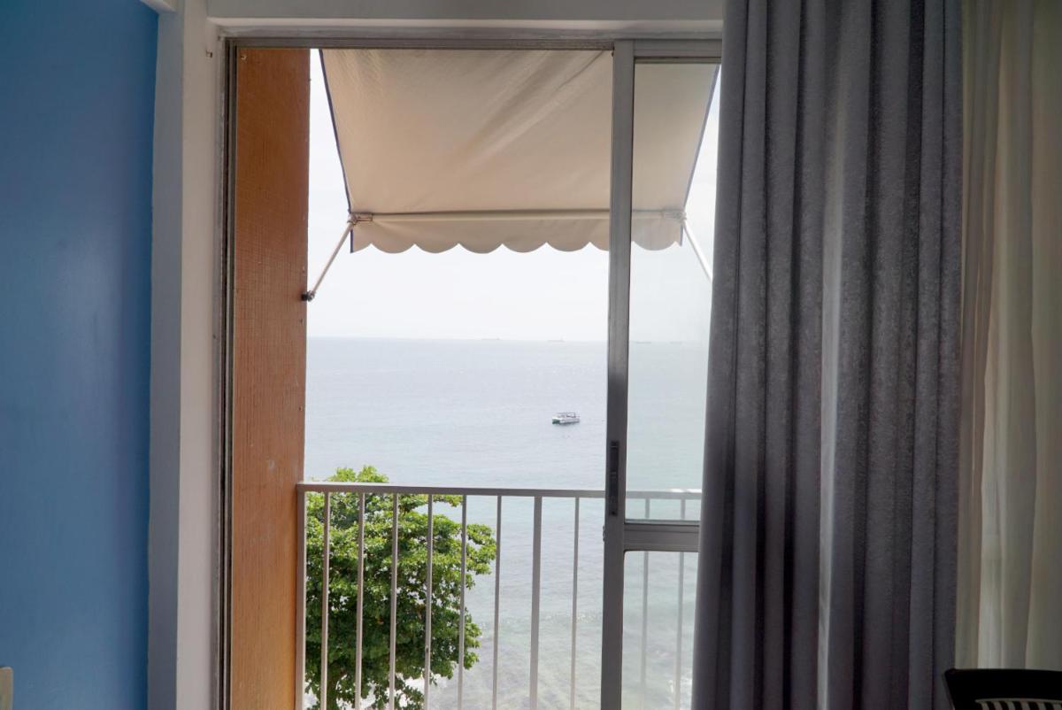 Apartment 610, vista Mar e Farol da Barra - Housity