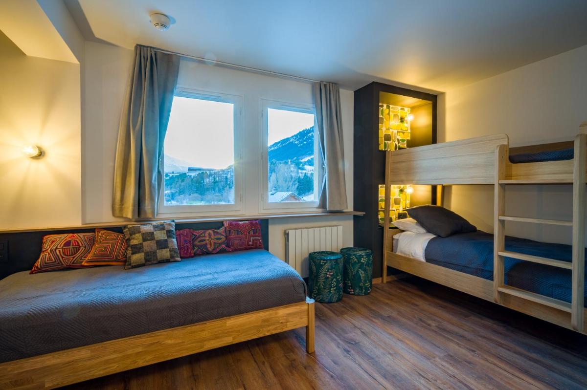 Un ou plusieurs lits dans un hébergement de l'établissement L'Outa Hotel Restaurant