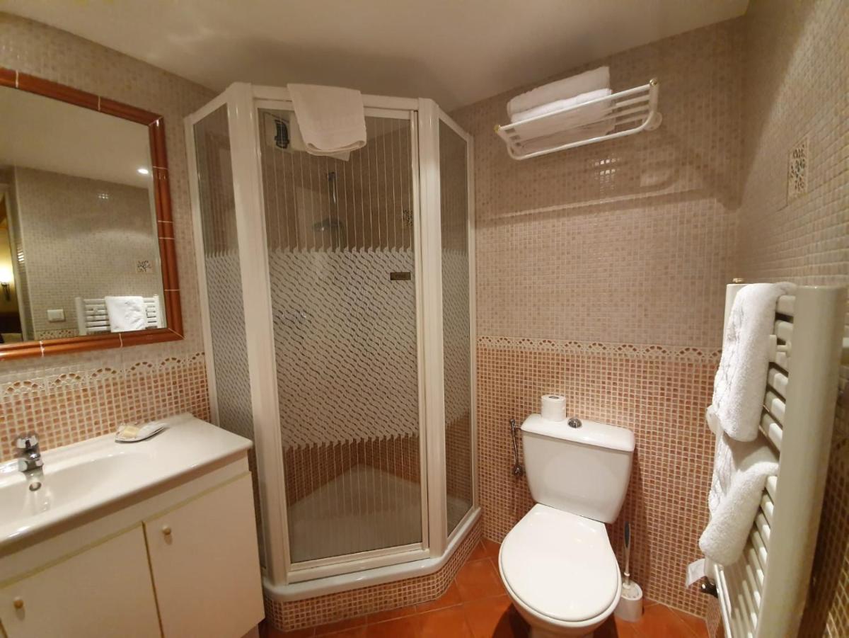 Salle de bains dans l'établissement Le Chalet Suisse
