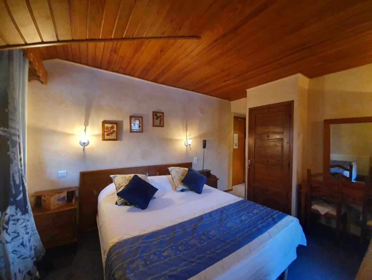 Un ou plusieurs lits dans un hébergement de l'établissement Le Chalet Suisse