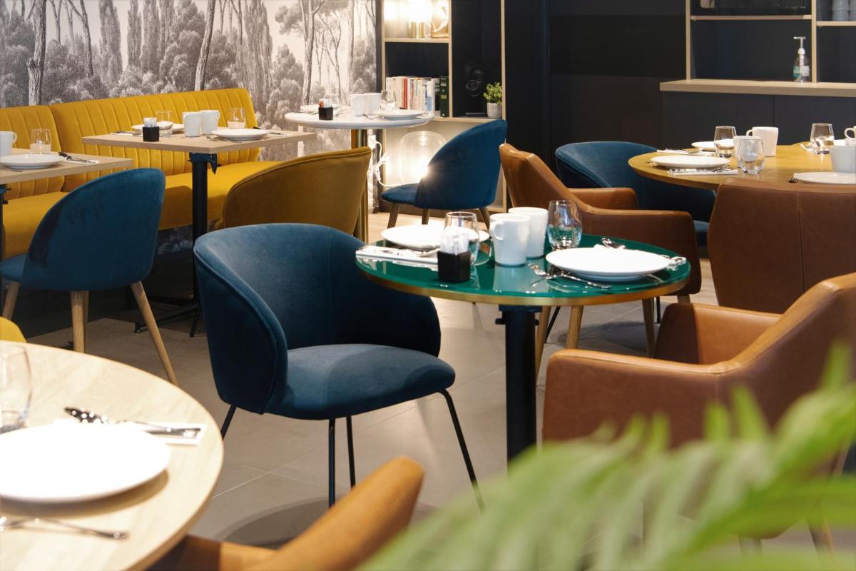 Coin salon dans l'établissement PADJA Hôtel & Spa Vannes