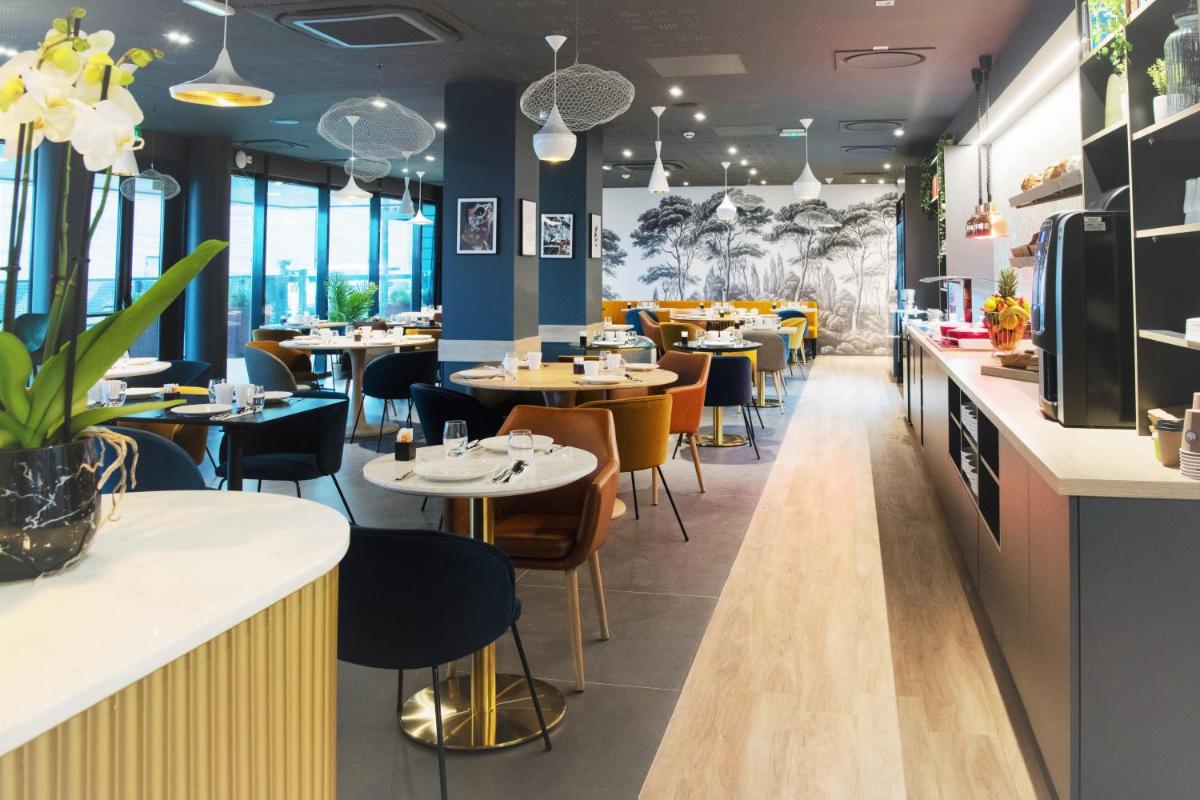 Restaurant ou autre lieu de restauration dans l'établissement PADJA Hôtel & Spa Vannes