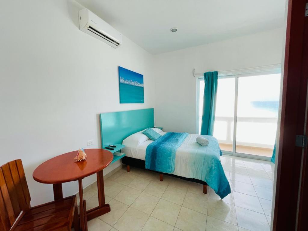 Habitación Amanecer Turquesa #5 - Housity