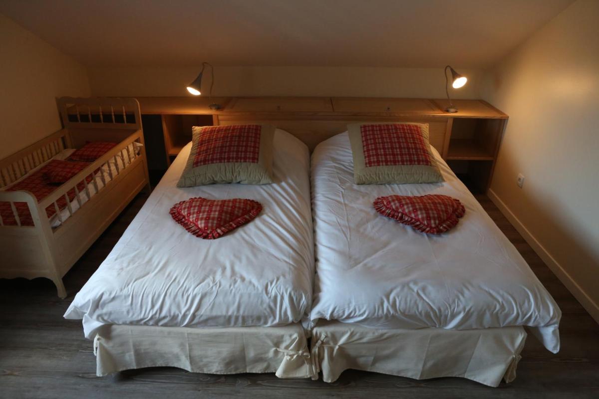 Un ou plusieurs lits dans un hébergement de l'établissement Hotel de la Jamagne & Spa