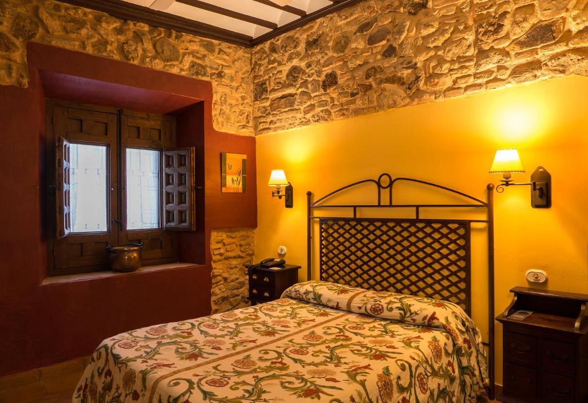 Cama o camas de una habitación en Hotel Spa La Casa del Rector Almagro